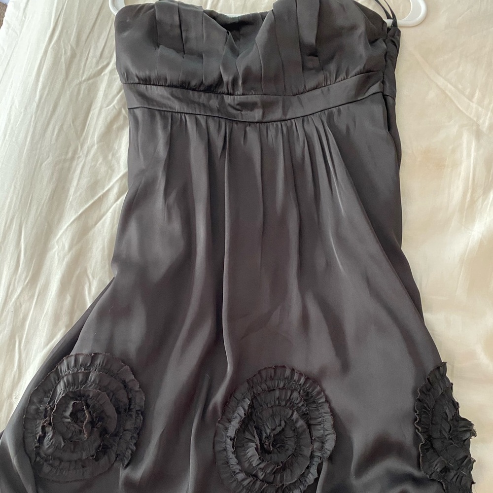 Black strapless dress with flower details